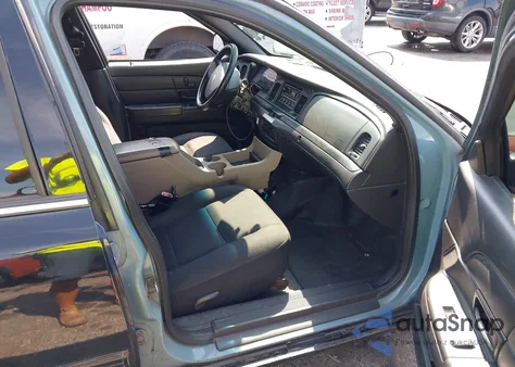 2009 Ford Crown Victoria Police/Police Interceptor z USA, uszkodzony, nr VIN 2FAHP71V59X125095